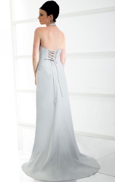 This chiffon destination bridal dress has a V neck halter and open back with