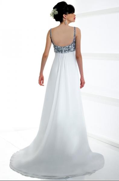  gown with soft sweetheart neckline and open scoop back has an empire 