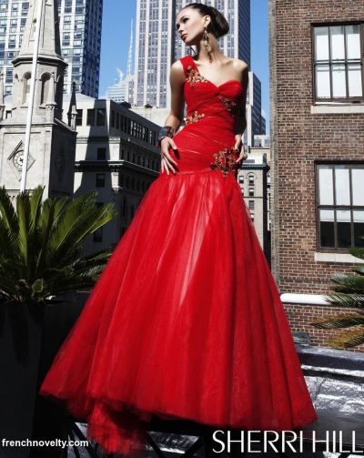 One shoulder prom gown with beading and flowy skirt Colors Black Red 