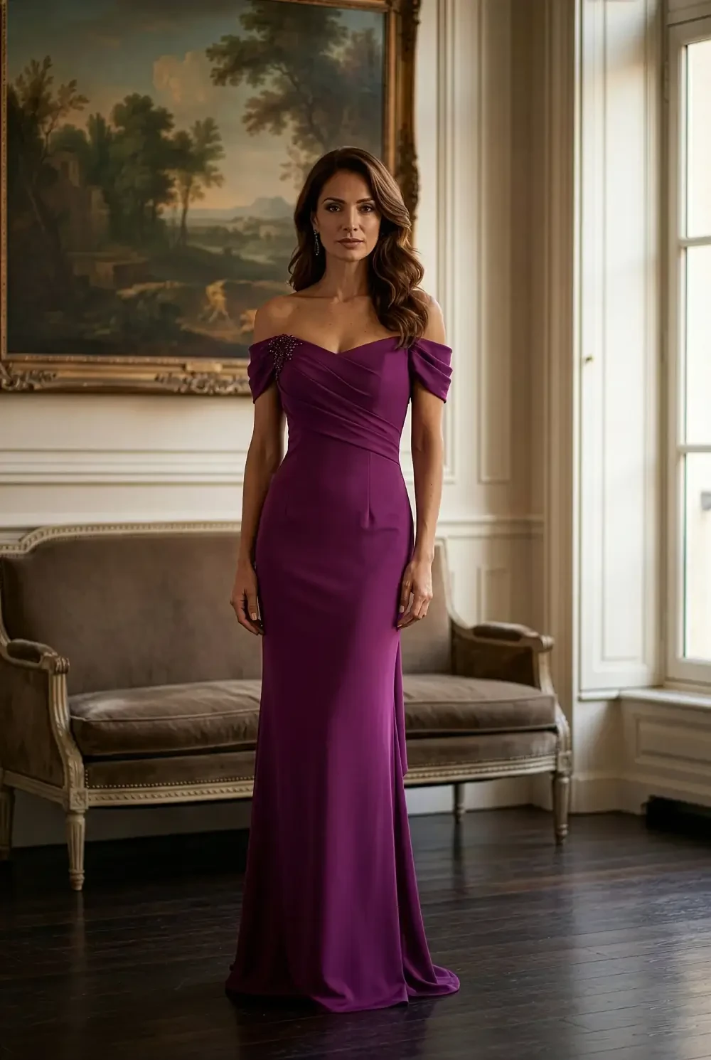 model is wearing a mulberry off the shoulder evening gown